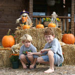 Blake & Grayson In Front Of Fall Decorations.