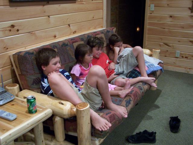 Austin, Zoee' Josh and Dustin Watching TV.
