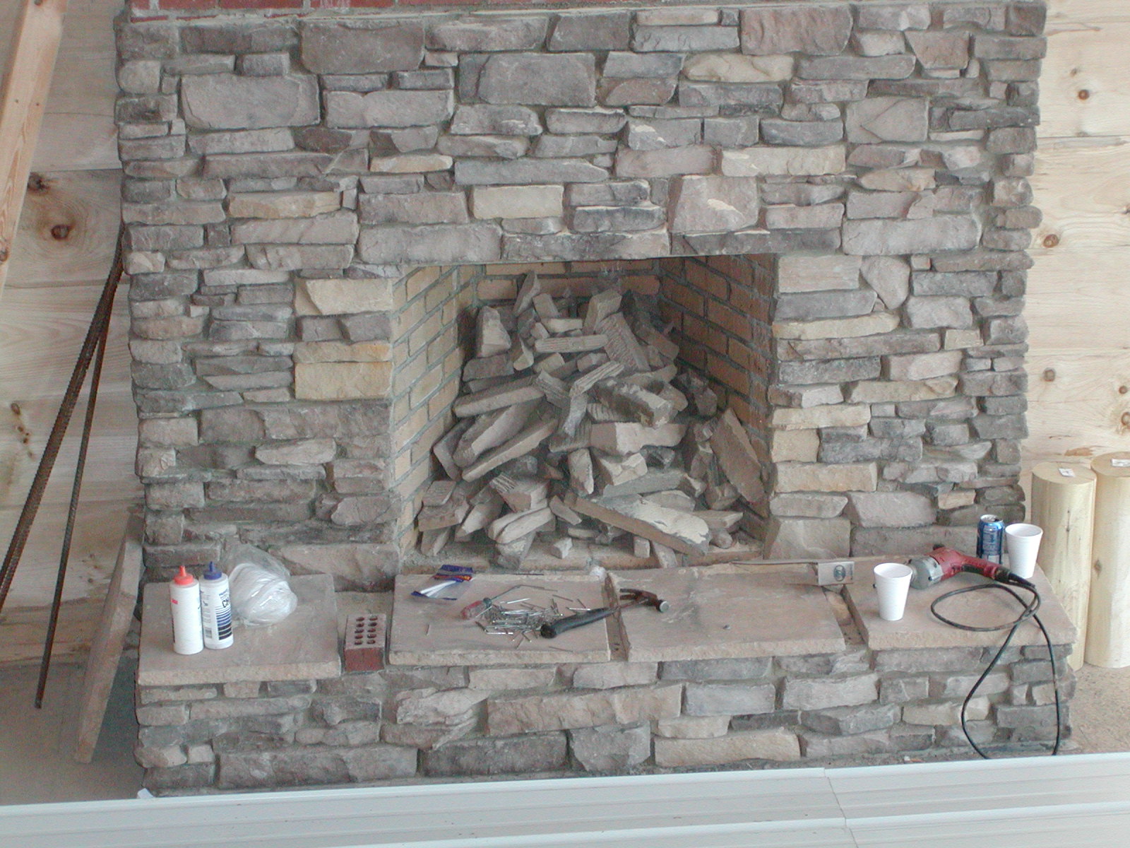 Starting To Look Like A Real Stone Fireplace.
