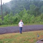 Brandon Standing In Front Yard At Cabin